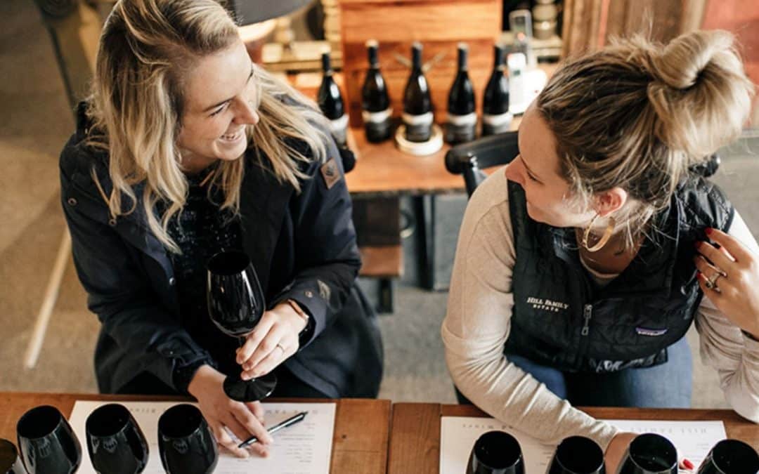 Ladies doing blind tasting at Hill Family