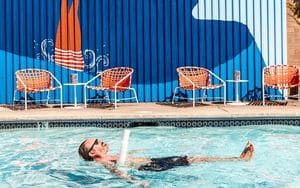 man floating in the pool at Dr. Wilkinson's