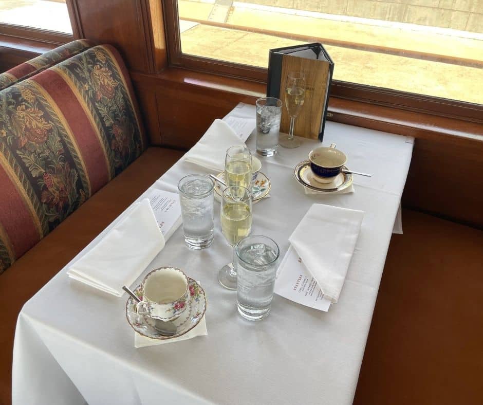 table set with champangne on the wine train
