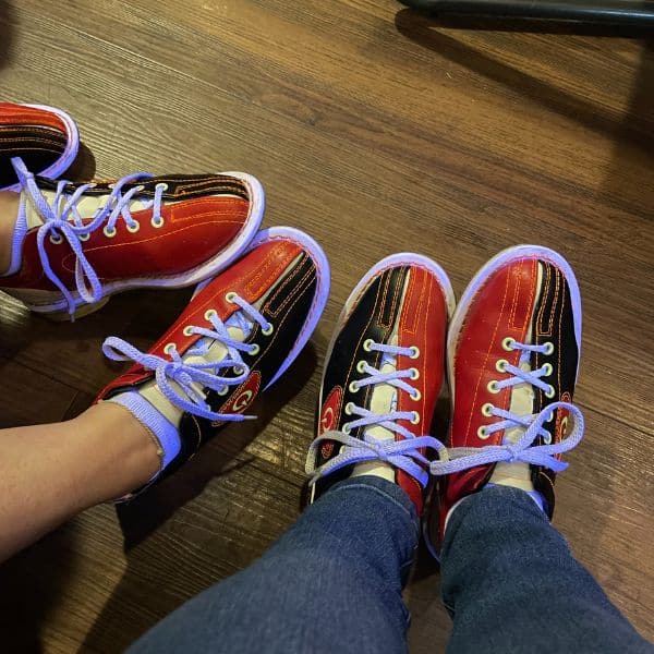 two peoples bowling shoes