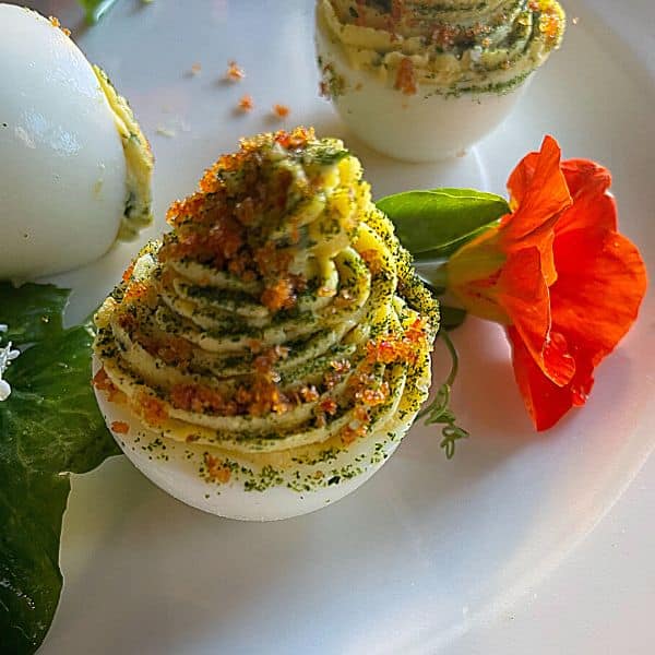 one deviled egg with flower