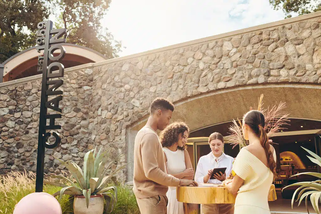 stone building with people gathered