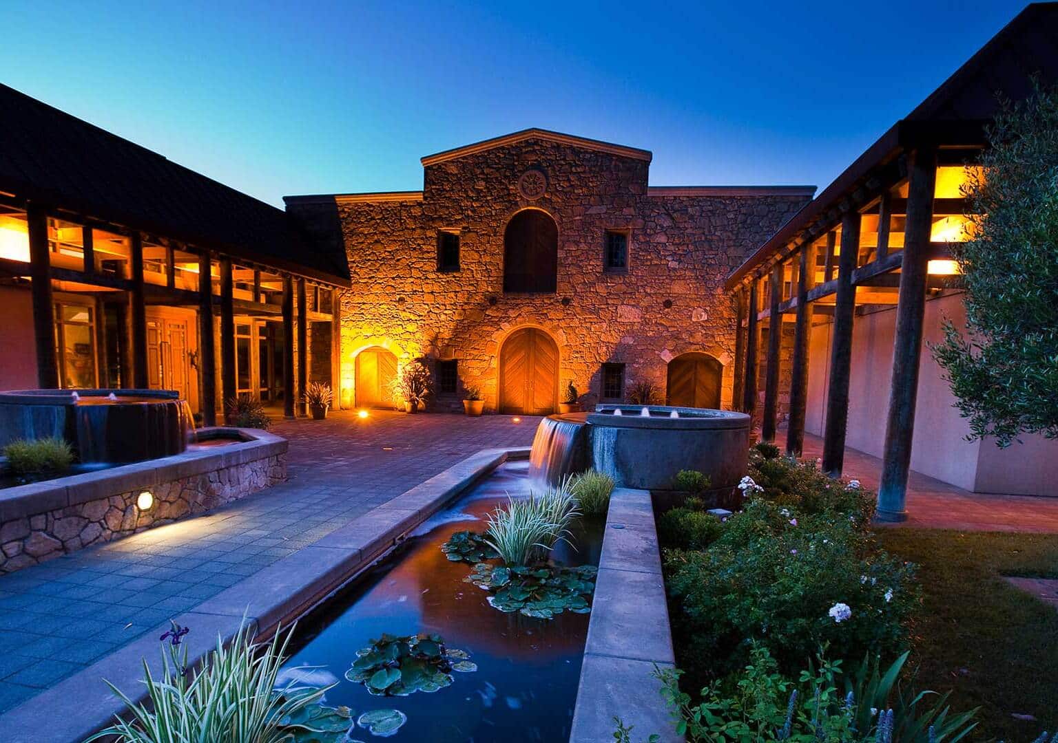 winery courtyard in the evening with water features