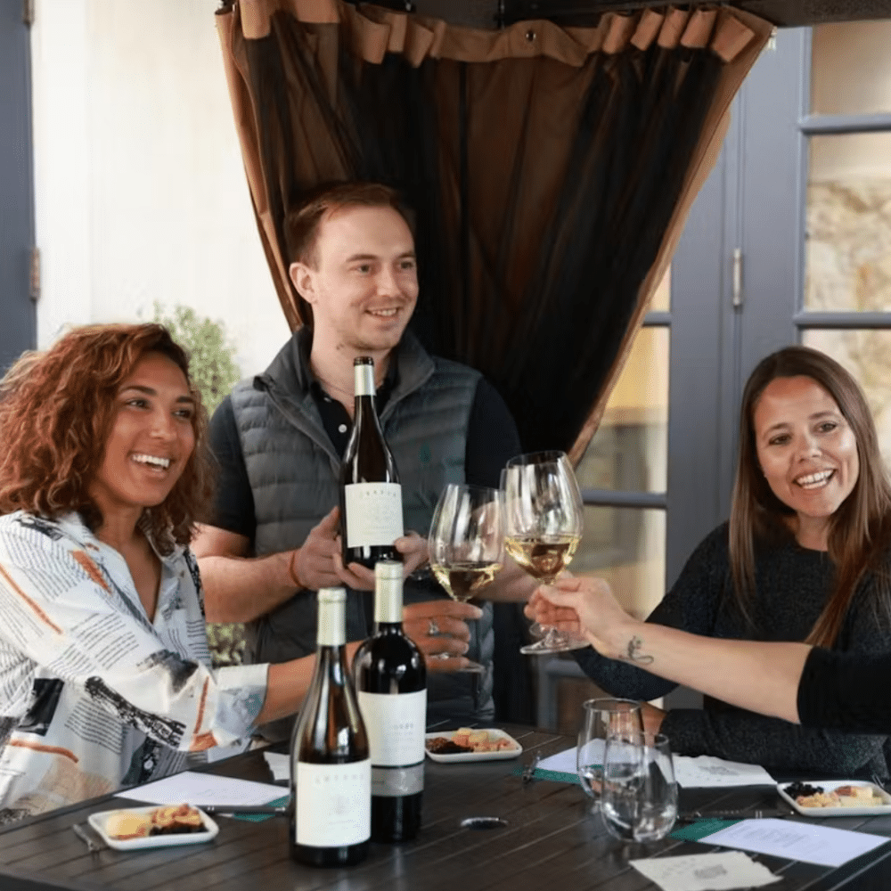 Jessup Cellars Guests tasting wines with wineglasses on table