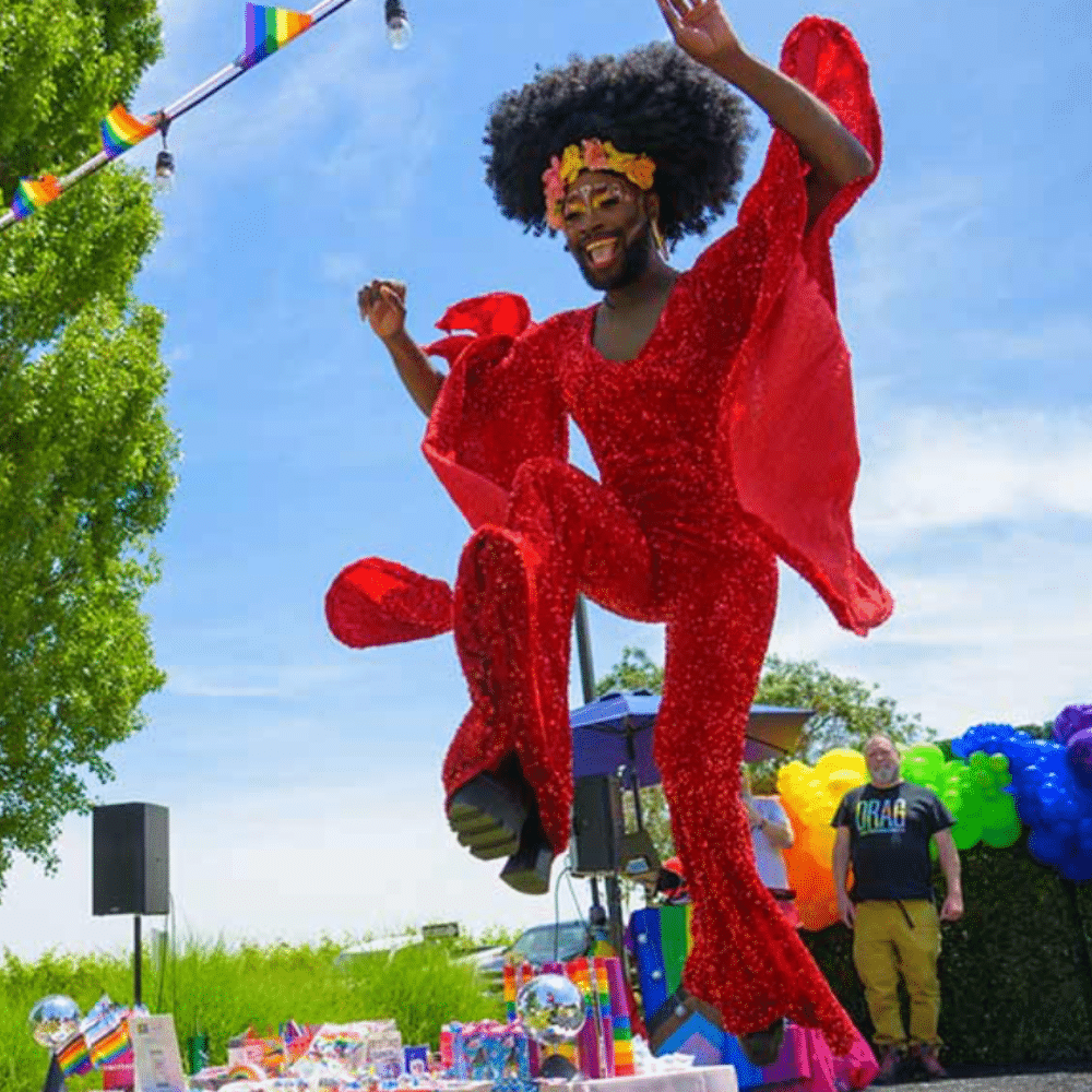 Person in red jumpsuit dancing Person in red jumpsuit dancing