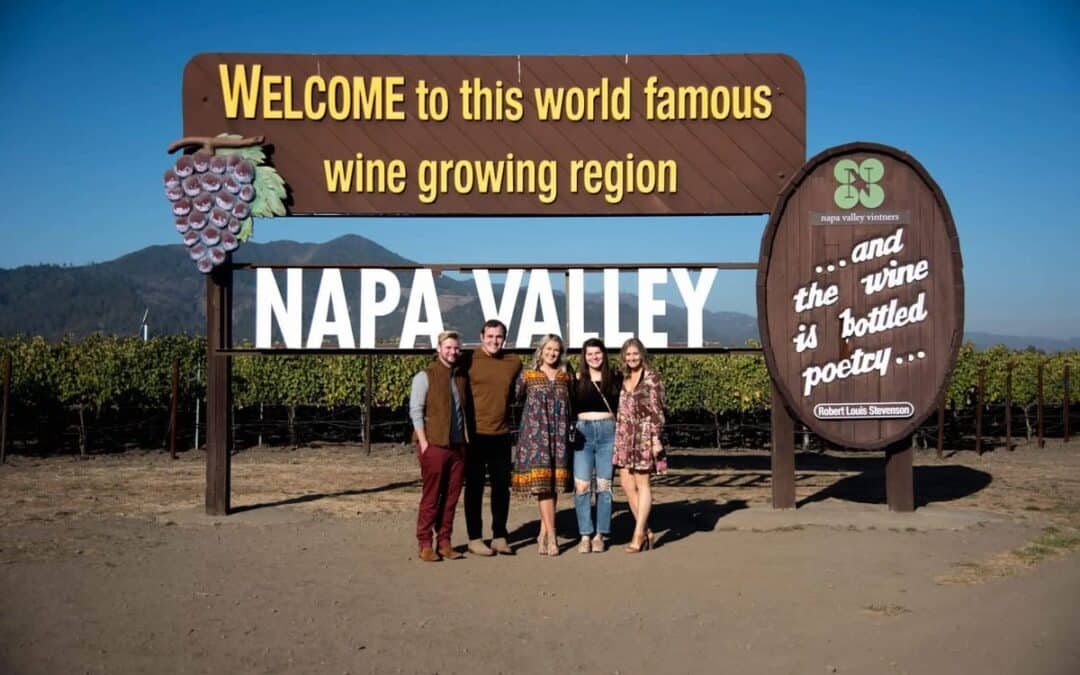people standing in front of napa valley sign