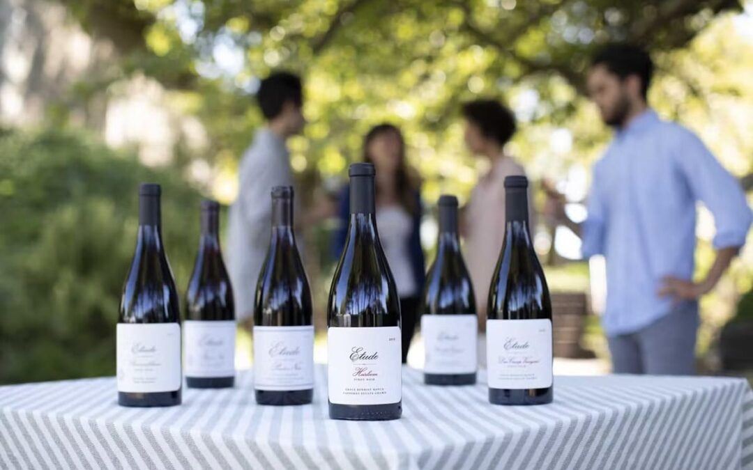 wine bottles sitting on a table outside