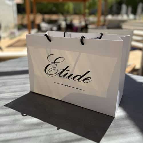 etude bag on table outside