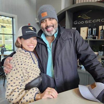 2 people inside standing at a counter