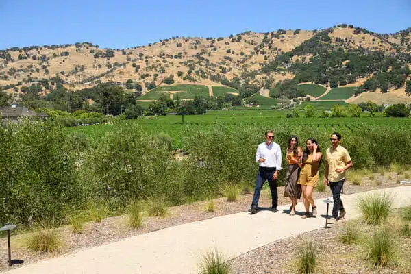 people walking on trail outside