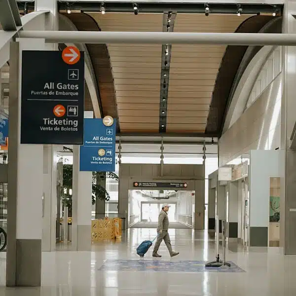 airport walk with person walking rolling luggage