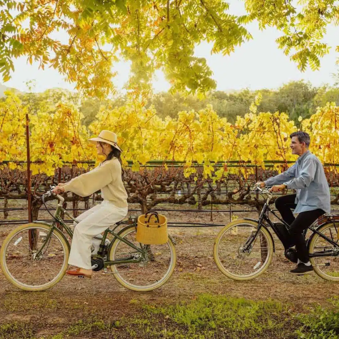 Fall-in-Love-with-Yountville-image-3 two people riding bikes in Yountville