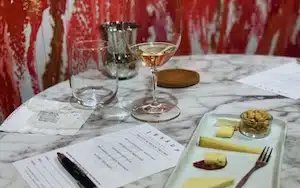 wine and cheese on a table