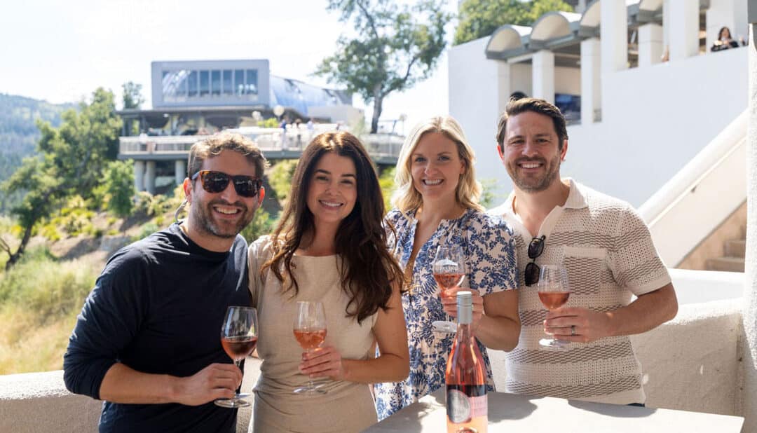 group of friends wine tasting