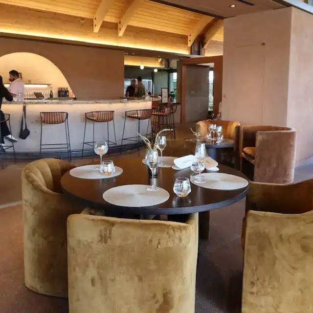 inside at Club CHANDON with a table setup