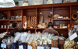 inside of bakery of bread and baked good in Yountville