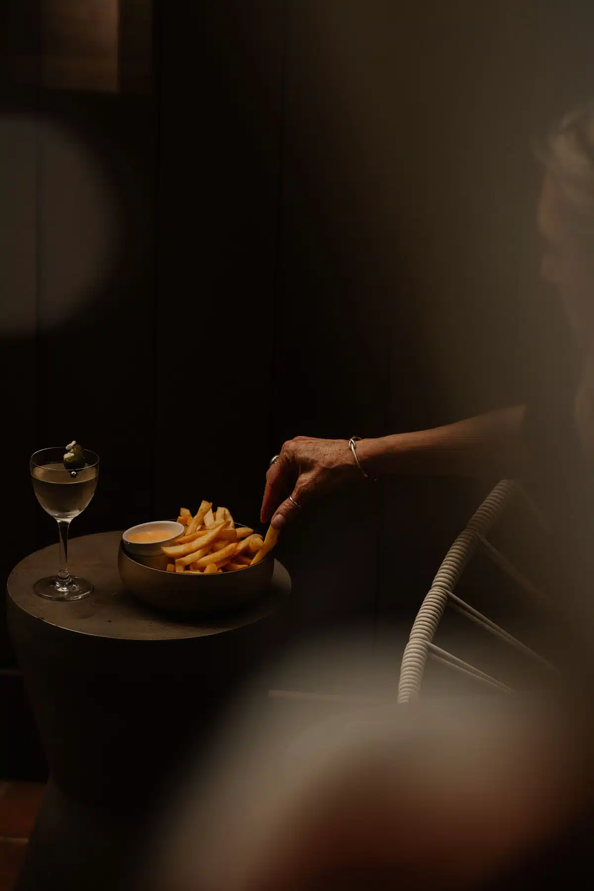 a martini and fries offered at the North Block Hotel